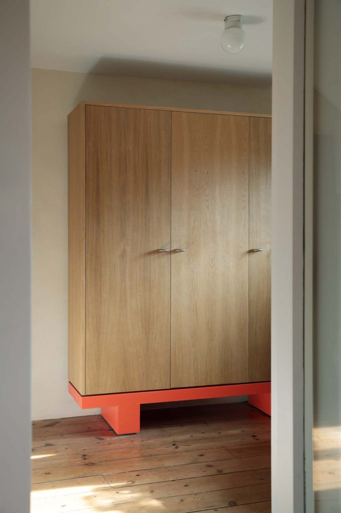 Kitchen cabinet in oak with orange base, bespoke kitchen design, wardrobe design