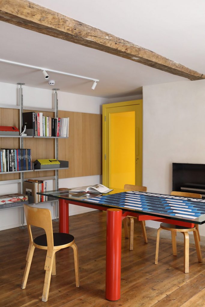 Cotswolds interior design studio, yellow door, Vitsoe shelving, Avlar Aalto furniture